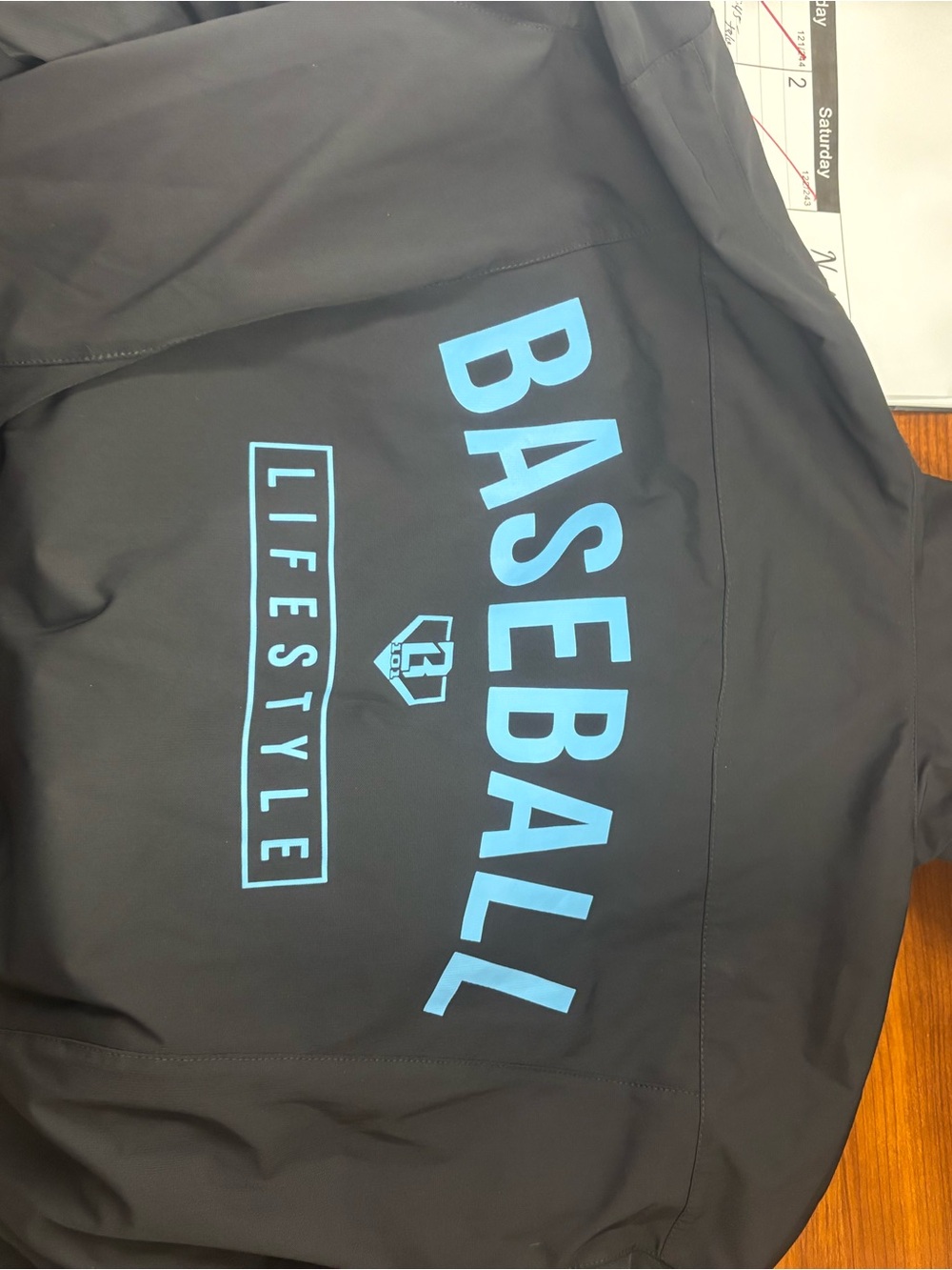 Kids Black Raincoat with Blue 'BASEBALL LIFESTYLE' Print